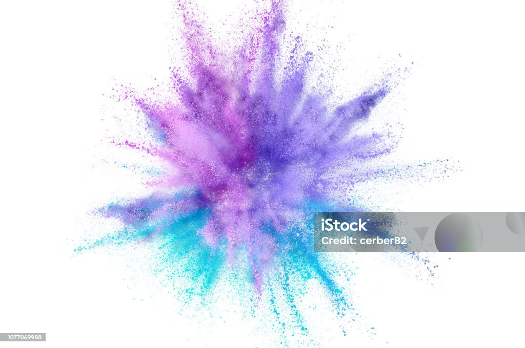 Colored powder explosion. Abstract closeup dust on backdrop. Colorful explode. Paint holi Exploding Stock Photo