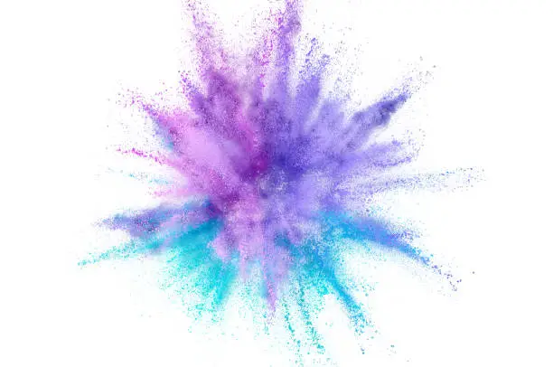Photo of Colored powder explosion. Abstract closeup dust on backdrop. Colorful explode. Paint holi