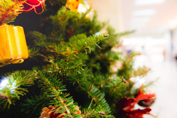 istock Decorated Christmas tree with toys, gift box, little pine and bauble. 1077075642