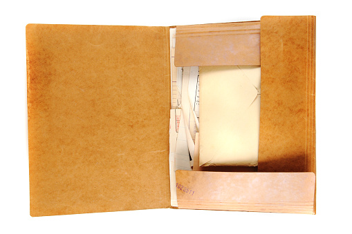 old top secret folder with documents isolated on the white background