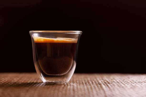istock Cup of espresso coffee on wodden background 1077078840
