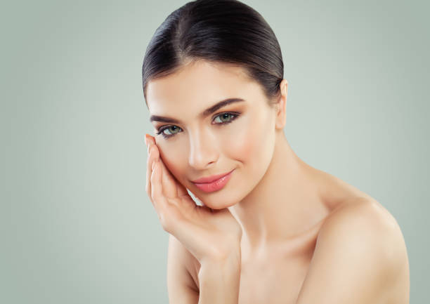 istock Perfect young woman with clear skin 1077084652