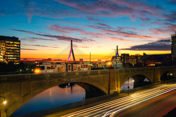 train in boston with bridge and sunrise background in morning time - boston sunset city bridge imagens e fotografias de stock