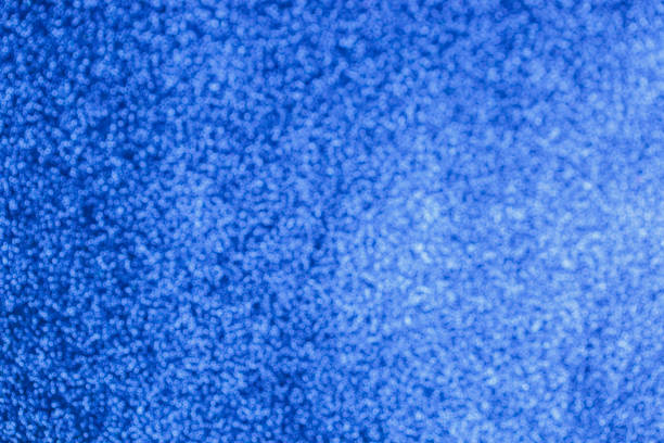 istock Defocused glitter electric blue christmas abstract background 1077086618