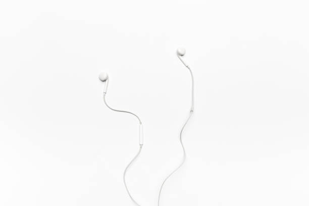 istock white Earphones isolated on white background 1077086640