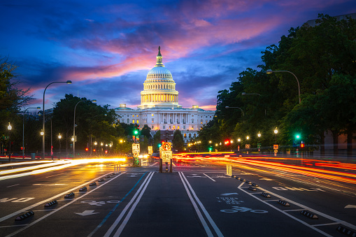 Capital building in Washington DC city at night wiht street and cityscape, USA, United states of Amarica