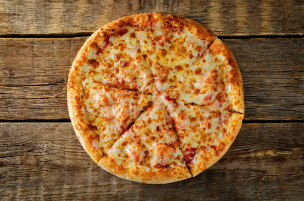 istock Pizza with cheese, tomato sauce and fresh tomatoes 1077090664