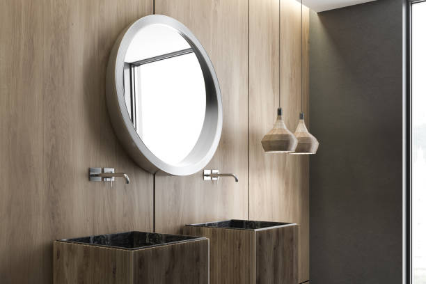 istock Double sink in wooden bathroom interior 1077099654