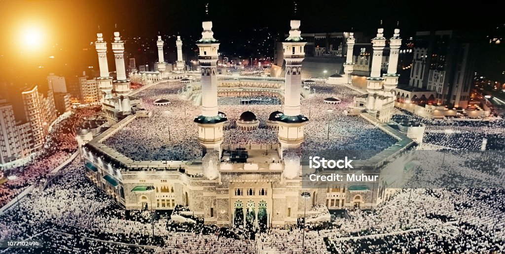 Praying in Mecca at Kaaba Hajj Stock Photo