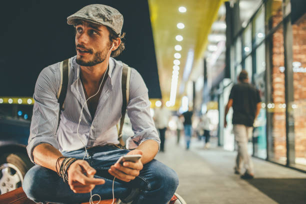 istock Charming man listening music 1077106470