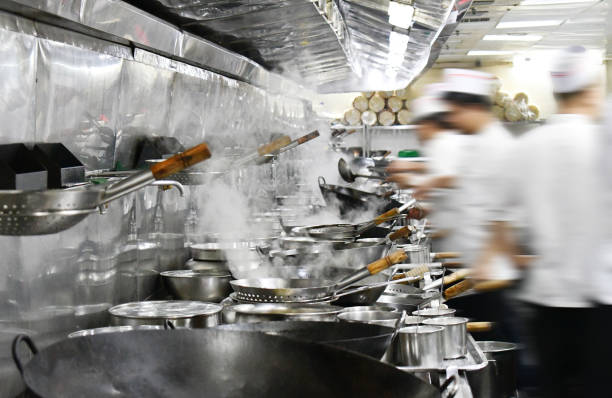 istock Busy chefs in Chinese restaurant kitchen 1077108706