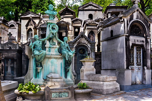 Paris, France - May 08, 2011:Graves and crypts in Pere Lachaise Cemetery, This cemetery is the final resting place for many famous people.