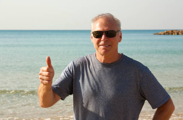 istock A man over 60 years shows a gesture all right 1077111172
