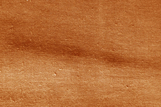 istock Cotton cloth texture in orange color. 1077111756