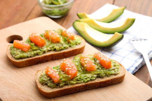 istock Toast with avocado and red fish 1077114860