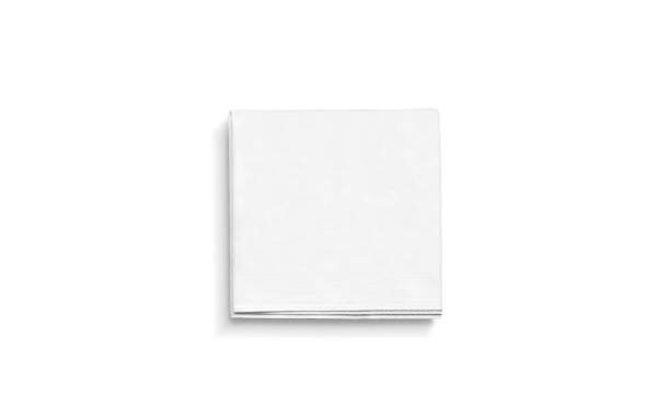 Blank white square folded napkin mock up, isolated Blank white square folded napkin mock up, isolated. Empty tissue doily mockup. Tableware for cafe or restaurant branding. Soft accessory towel template. napkin stock pictures, royalty-free photos & images