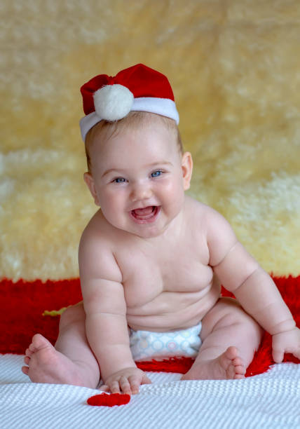istock Cute Red Hood Happy Baby 1077119152