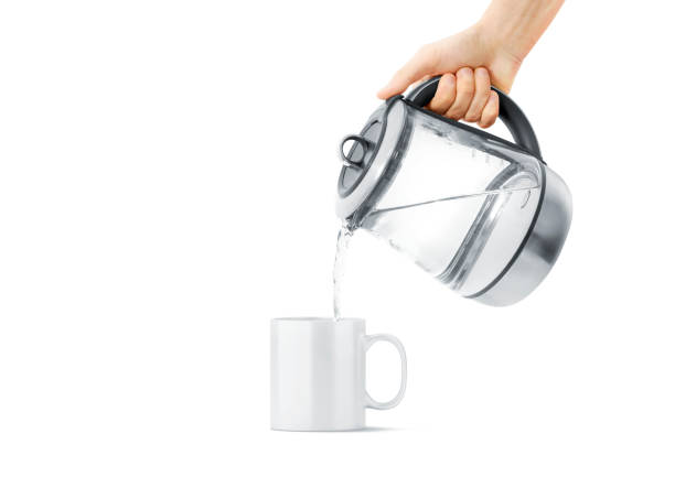 istock Blank white ceramic mug with hot teapot mock up, isolated 1077121606