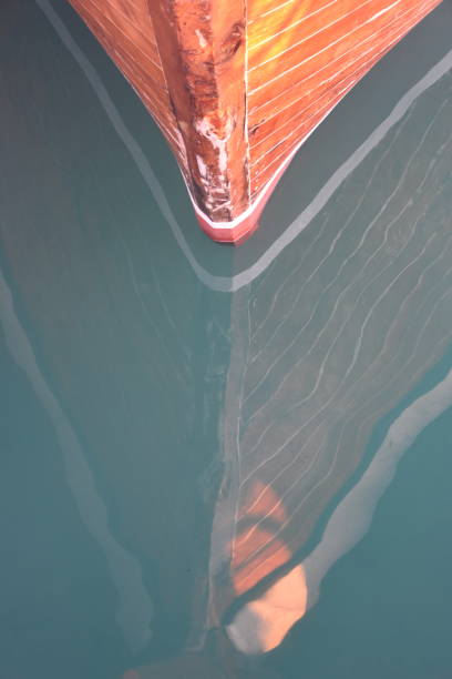 istock Reflection of a boat in water 1077122800