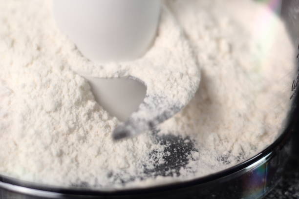 istock Flour in Food Processor Cup. Making Shoofly Tart Series. 1077125324