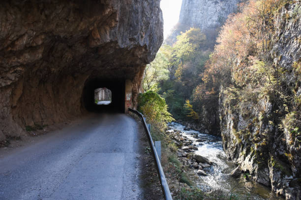 istock Old rural road with handmade tunnels 1077128512