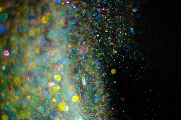 istock Abstract background with glittering color particles with copy space 1077131732