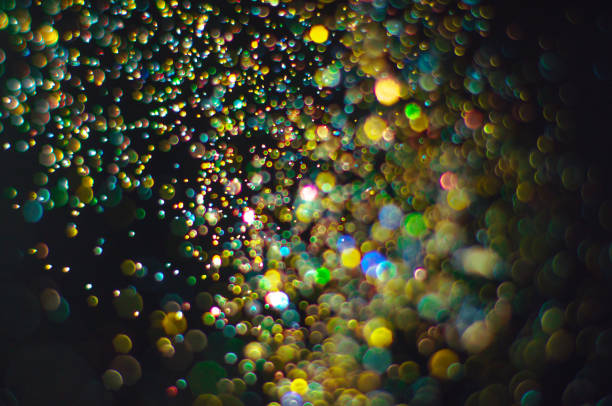 istock Abstract background with glittering color particles 1077131818