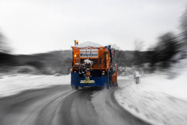 istock Winter service in action - bad road conditions 1077132730