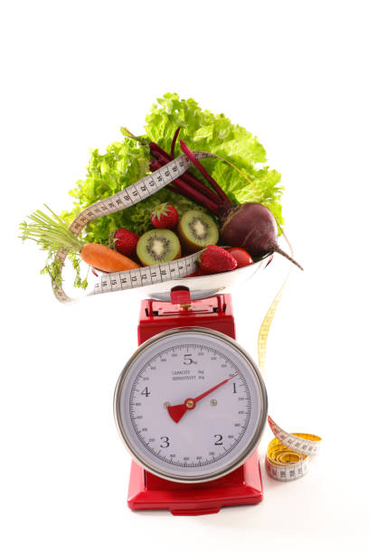 istock balance with vegetable, diet food concept 1077133006