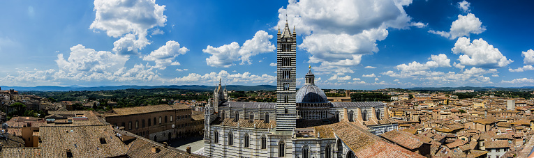 the old city of Siena is full of tower and church and create a suggestive view