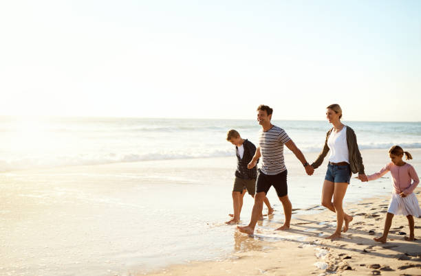 istock Family beach fun 1077136460