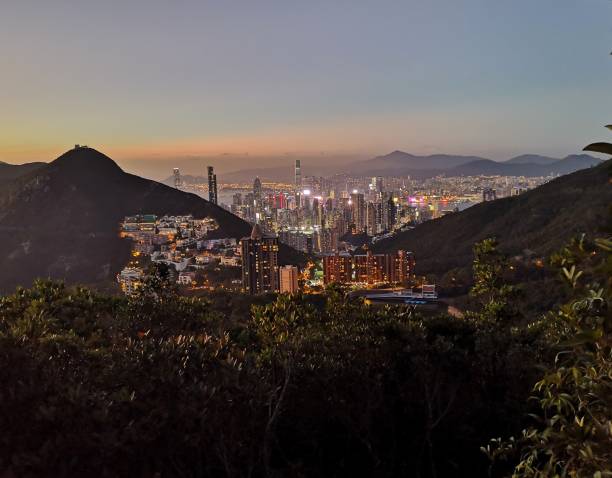 istock Hong Kong cityscape at dusk from Violet Hill 1077146504
