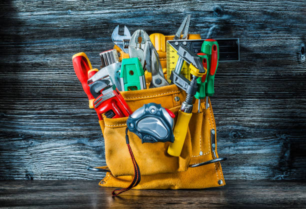 istock big set of construction tools in tolbelt. 1077157854