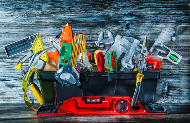 istock very big set of construction tools in toolbox on vintage wood. 1077158100