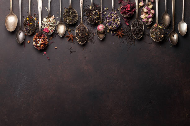 istock Various tea in spoons. Black, green and red tea 1077158268