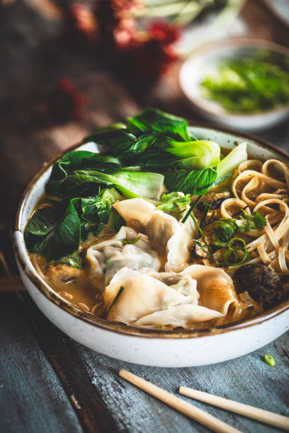 Chinese Noodle Soup with Yellow Curry and Wontons