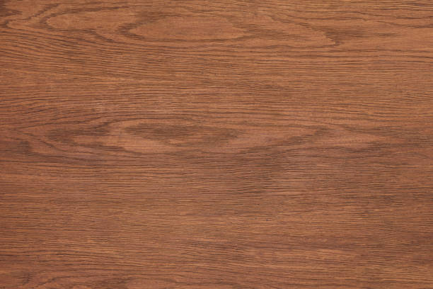 istock brown textured wooden background with copy space 1077163760