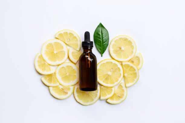 istock Fresh lemon with lemon essential oil on a white background. 1077163792