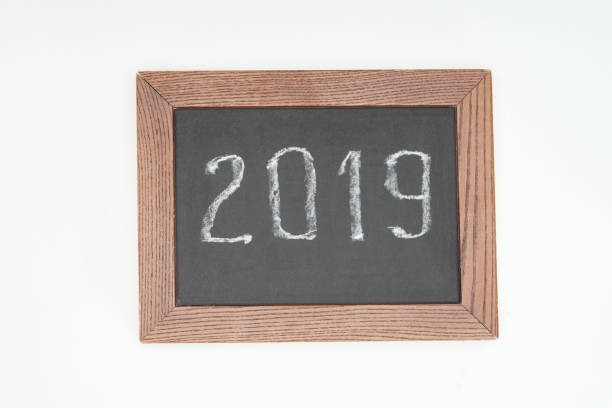 istock top view of 2019 date witten on chalk board isolated on white 1077163850