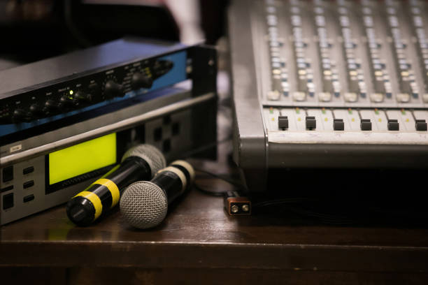 istock professional stage sound mixer closeup at sound engineer hand using audio mix slider working during concert performance 1077163896
