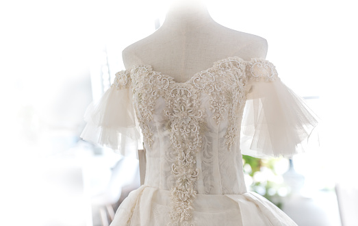 Wedding dress on display, prepared for the bride