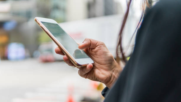 istock Woman texting smart phone in New York 1077165338