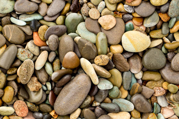 istock Abstract background with pebbles, sea stones texture. 1077168216