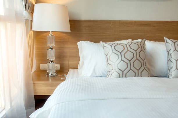 istock house beautiful design concept with soft cozy white pillow on bed in bedroom interior background 1077168750