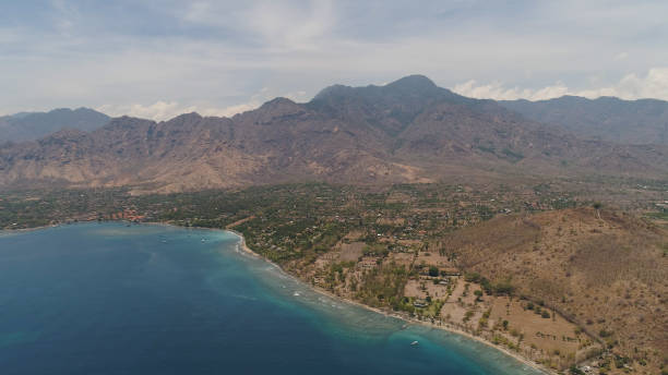 istock tropical landscape with, mountains, beach 1077170956