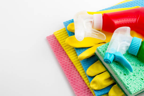 istock Cleaning products with cleaning material, isolated on white 1077170970