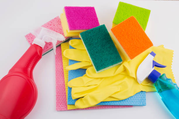istock Cleaning products with cleaning material, isolated on white 1077171134