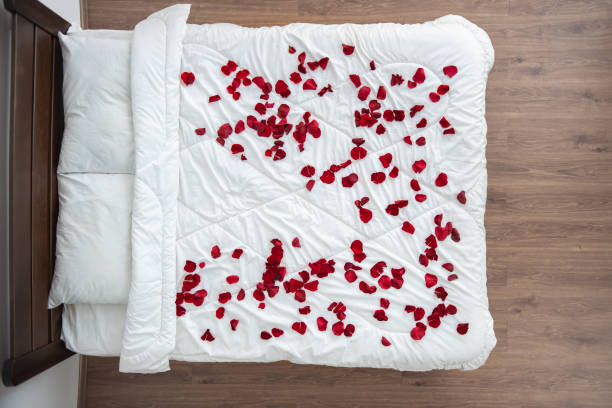 istock The bed with a rose petals. view from above 1077175260