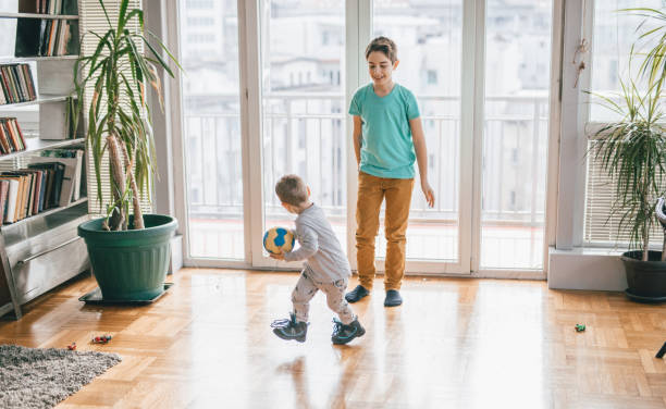 calcio in casa - soccer child indoors little boys foto e immagini stock