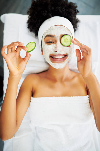 Shot of an attractive young woman getting a facial at a beauty spa